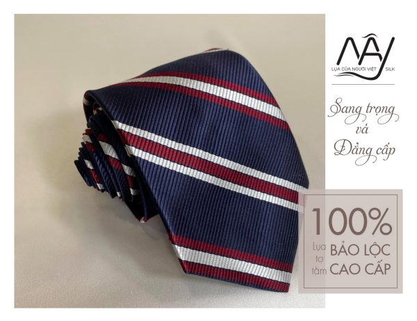 woven silk tie with blue and red motifs