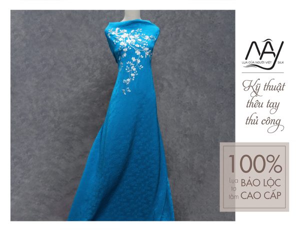 High-quality Ao Dai fabric hand-embroidered with blue apricot blossom